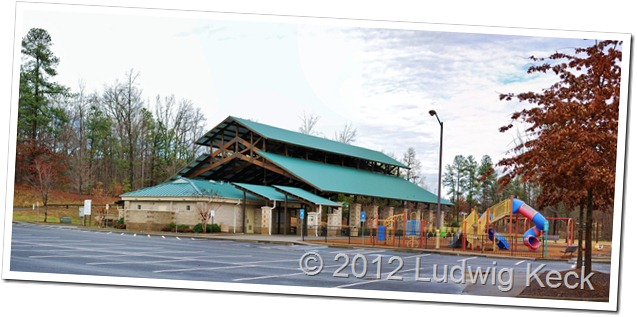 Photo of a park shelter. Image has border and a copyright notice.